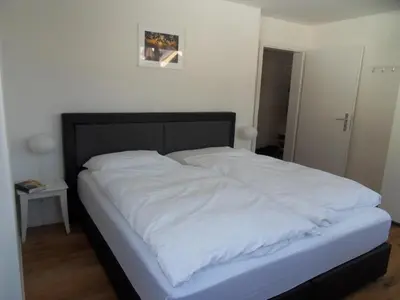 Ein Bett oder Betten in einem Zimmer der Unterkunft Apartment Silverpeak by Silberhorn Hotel