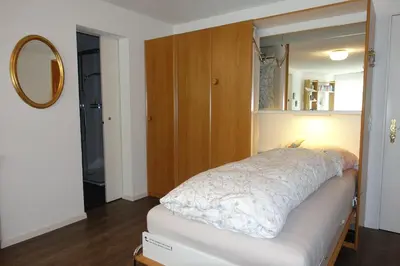 Ein Bett oder Betten in einem Zimmer der Unterkunft Studio Willimann Haus Dala im 4 Stock