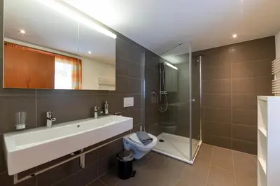 Ein Badezimmer in der Unterkunft UnderDach Holiday House