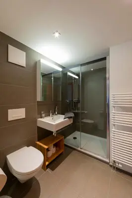 Ein Badezimmer in der Unterkunft UnderDach Holiday House