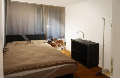 Ein Bett oder Betten in einem Zimmer der Unterkunft Switzerland Iseltwald Apartment
