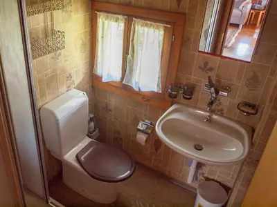 Ein Badezimmer in der Unterkunft Chalet Alphütte