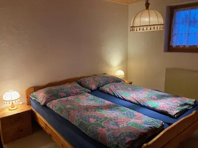 Ein Bett oder Betten in einem Zimmer der Unterkunft Chalet Gerbera