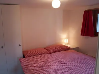 Ein Bett oder Betten in einem Zimmer der Unterkunft Chalet Bergfink