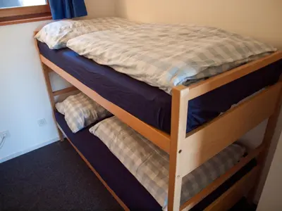 Ein Bett oder Betten in einem Zimmer der Unterkunft Chalet Bergfink