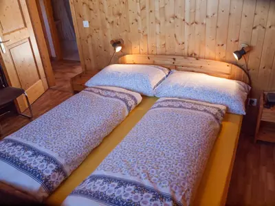 Ein Bett oder Betten in einem Zimmer der Unterkunft Chalet Skilift