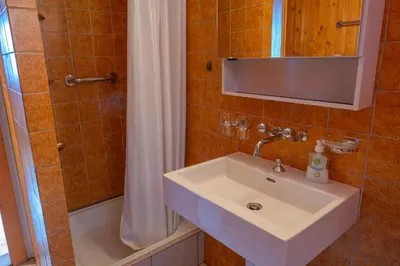Ein Badezimmer in der Unterkunft Chalet Allegra
