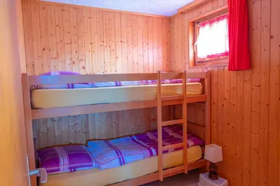 Ein Bett oder Betten in einem Zimmer der Unterkunft Chalet Allegra