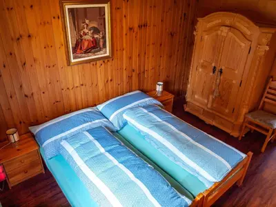 Ein Bett oder Betten in einem Zimmer der Unterkunft Chalet Bärgsunna