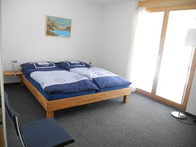 Ein Bett oder Betten in einem Zimmer der Unterkunft Adlerhorst