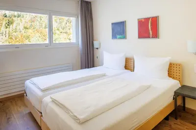 Ein Bett oder Betten in einem Zimmer der Unterkunft Hapimag Ferienwohnungen Interlaken