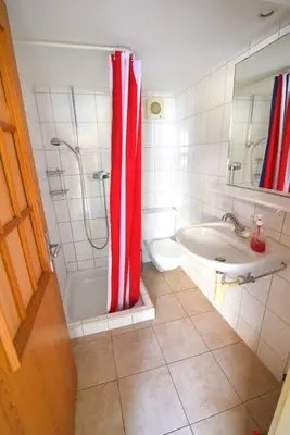 Ein Badezimmer in der Unterkunft The River Holiday Apartment
