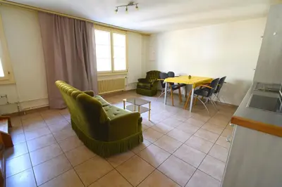 Ein Sitzbereich in der Unterkunft The River Holiday Apartment