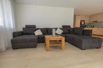 Ein Sitzbereich in der Unterkunft Mönch Apartment - Aare Jungfrau AG