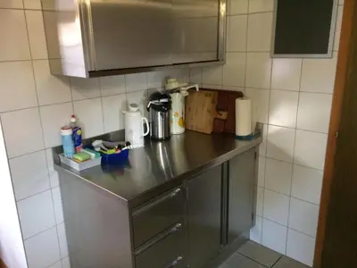 Küche/Küchenzeile in der Unterkunft Gruppenhaus im Walliser Alpstyle