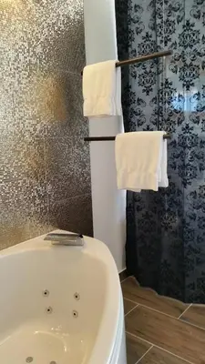 Ein Badezimmer in der Unterkunft Hotel Crystal
