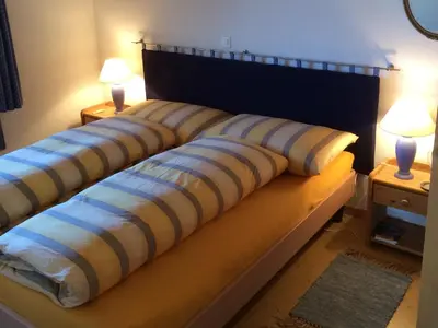 Ein Bett oder Betten in einem Zimmer der Unterkunft Chalet Bergkristall