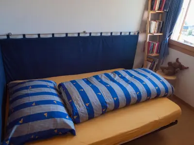 Ein Bett oder Betten in einem Zimmer der Unterkunft Chalet Bergkristall