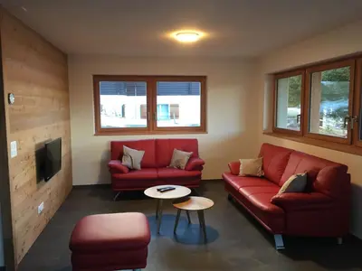 Ein Sitzbereich in der Unterkunft Chalet Seviann