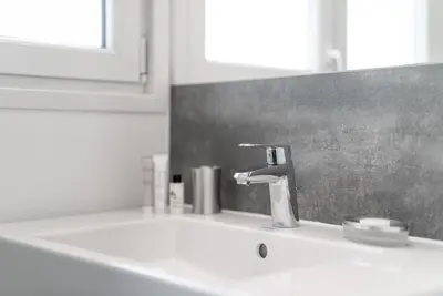 Ein Badezimmer in der Unterkunft Haus Kirchplatz 4 by Zermatt Premium Apartments