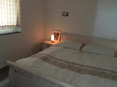 Ein Bett oder Betten in einem Zimmer der Unterkunft Casa in Königs GarteN