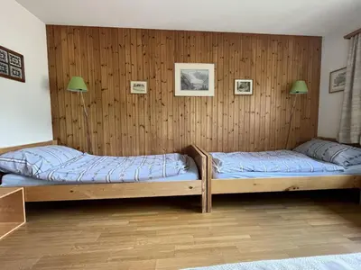 Ein Bett oder Betten in einem Zimmer der Unterkunft Apartment Akelei - gross by Interhome