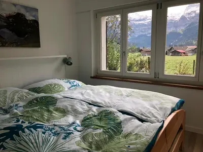 Ein Bett oder Betten in einem Zimmer der Unterkunft Apartment Chalet Claudia by Interhome