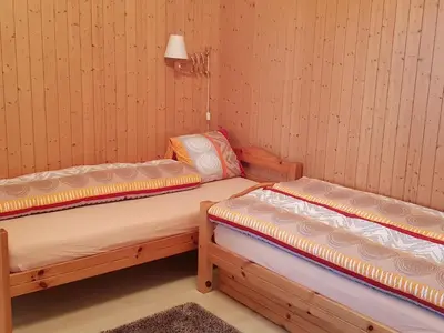Ein Bett oder Betten in einem Zimmer der Unterkunft Apartment Amiel EG Süd by Interhome