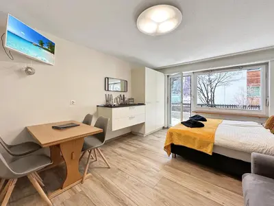 Ein Bett oder Betten in einem Zimmer der Unterkunft Phoenix Studio - Haus Astral - Zermatt