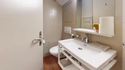 Ein Badezimmer in der Unterkunft Reka-Feriendorf Hasliberg