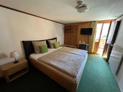 Ein Bett oder Betten in einem Zimmer der Unterkunft Hotel Steinbock