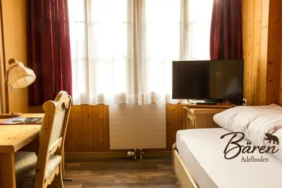 Ein Bett oder Betten in einem Zimmer der Unterkunft Hotel Bären