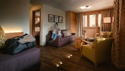 Ein Sitzbereich in der Unterkunft Hotel Landhaus