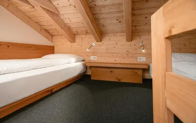 Ein Bett oder Betten in einem Zimmer der Unterkunft Hotel Landhaus