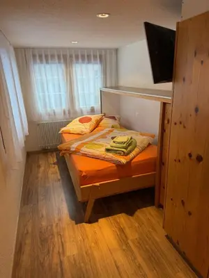 Ein Bett oder Betten in einem Zimmer der Unterkunft Mier Gfallt`s