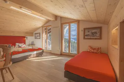 Ein Bett oder Betten in einem Zimmer der Unterkunft Alpinhotel Bort