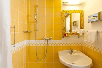 Ein Badezimmer in der Unterkunft Sporthotel Wildstrubel