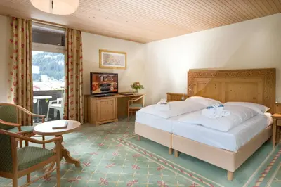 Ein Bett oder Betten in einem Zimmer der Unterkunft Sporthotel Wildstrubel