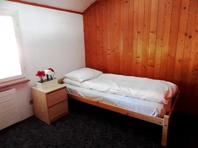 Ein Bett oder Betten in einem Zimmer der Unterkunft BASE Cafe