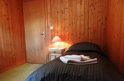 Ein Bett oder Betten in einem Zimmer der Unterkunft BASE Cafe