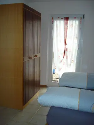 Ein Bett oder Betten in einem Zimmer der Unterkunft Ferienwohnung Lenggenhager Plantzette