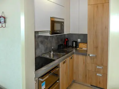 Küche/Küchenzeile in der Unterkunft Apartment Impéria 10 by Interhome
