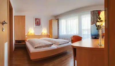 Ein Bett oder Betten in einem Zimmer der Unterkunft Hotel Eden No. 7