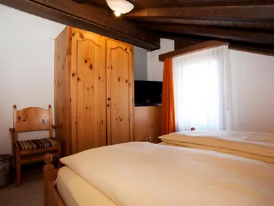 Ein Bett oder Betten in einem Zimmer der Unterkunft Ambiente Guesthouse