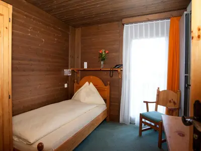 Ein Bett oder Betten in einem Zimmer der Unterkunft Ambiente Guesthouse