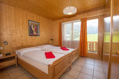 Ein Bett oder Betten in einem Zimmer der Unterkunft Chalet Falki