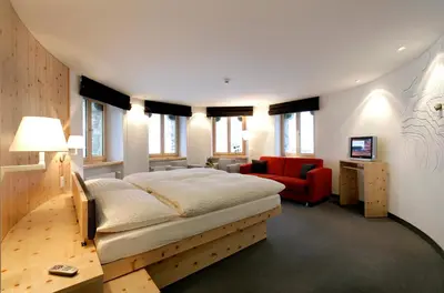 Ein Bett oder Betten in einem Zimmer der Unterkunft 3100 Kulmhotel Gornergrat