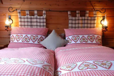 Ein Bett oder Betten in einem Zimmer der Unterkunft Salzano Basic Rooms Interlaken