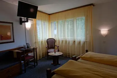 Ein Bett oder Betten in einem Zimmer der Unterkunft Schlosshotel - Self Check-In Hotel