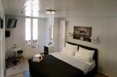 Ein Bett oder Betten in einem Zimmer der Unterkunft Chalet Maria Interlaken